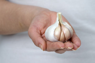 holding garlic