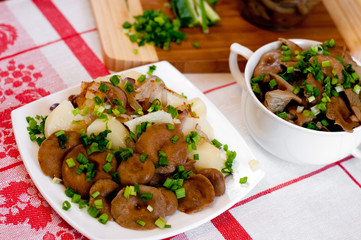 Marinated mushrooms and boiled potatoes