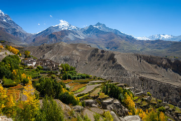 Snow peak mountains with village in front, Nepal