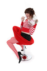 Woman eating marshmallows.