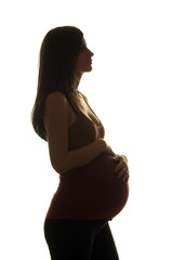 Silhouette of a beautiful pregnant woman