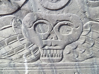 Skull on headstone