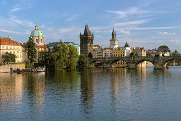 Fototapeta premium Charles Bridge in Prague at the end of a summer day