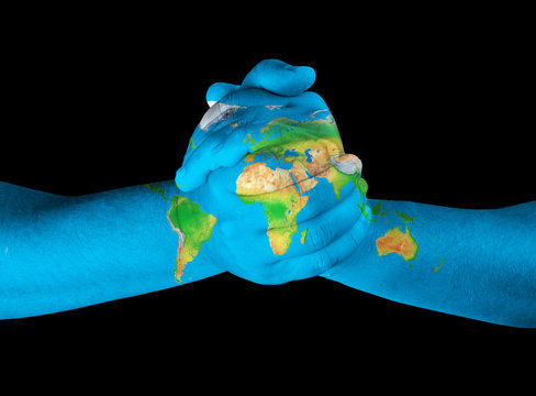 Map painted on hands showing concept -world in our hands