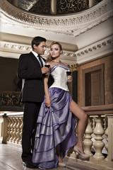 Beauty romantic young couple in love in misterious mansion