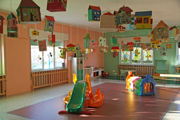 living room full of games and slides of a nursery