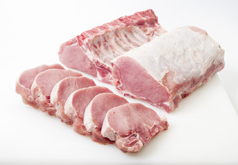 raw pork isolated on white - ready to cook - obrazy, fototapety, plakaty