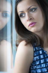 Young woman and rain drops