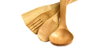 Wooden cooking utensils isolated on white
