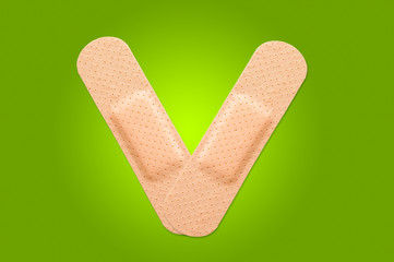 First-aid plaster in V shape
