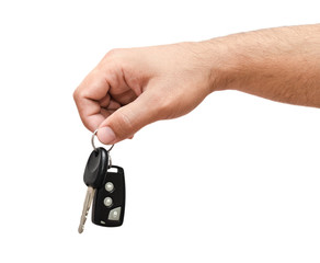 Male hand holding a car key - 46336652