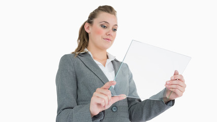 Businesswoman looking at pane