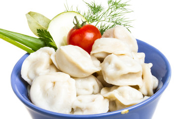 Bowl with traditional russian dish - pelmeni