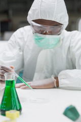 Woman working in protective suit