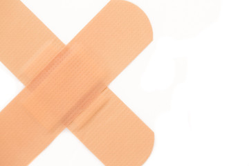 Close-up of two plasters