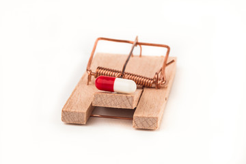 Mousetrap with a pill