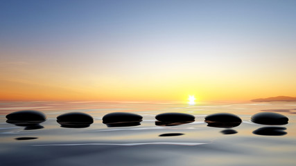 Scenic view of lake with Zen stones in the water