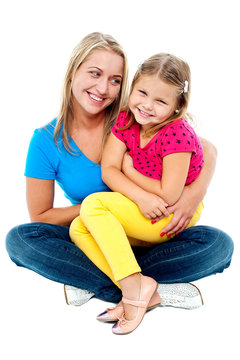 Cute Daughter Sitting In Mother's Lap