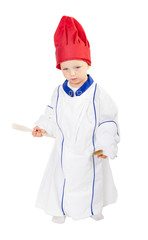 baby cook chef with food equipment