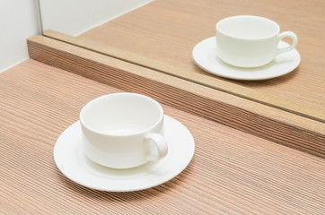 Cup of tea in the mirror