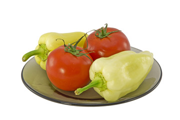 Two bell peppers and two tomatoes