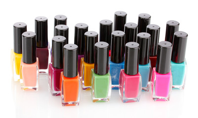 Obraz premium Group of bright nail polishes isolated on white