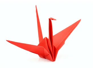 Fotobehang Kraanvogels Isolated red origami bird  © osoznaniejizni