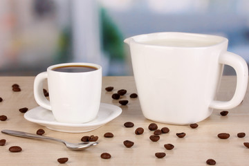 A cup of strong coffee and sweet cream