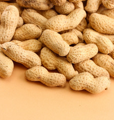 tasty peanuts, on beige background