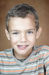 Portrait of a cute smiling boy