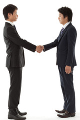 young businessman handshake
