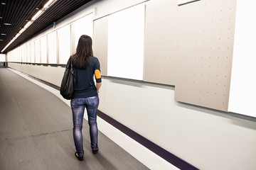 a woman looking at the pictures