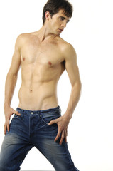 Fototapeta premium a handsome man athletic, male model posing in the studio,