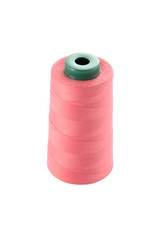 Roll of spun for sewing machine on white background.