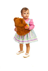 Toddler girl holding teddy bear