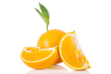 Oranges with leaves isolated on white