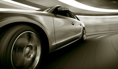 Obraz premium Car driving fast in tunnel