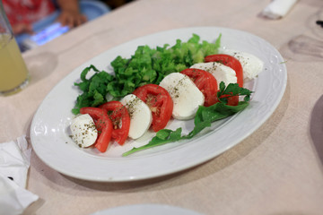 Slices of tomatoes and cheese