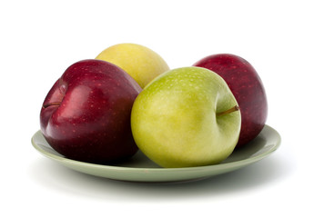 Apples pile on plate
