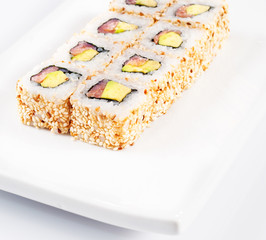 sushi roll on white plate