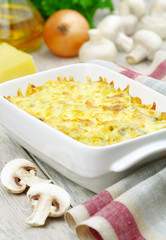 Baked potato with cheese and mushrooms