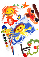 collage of children's drawings, watercolors and brushes