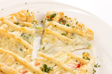 tasty quiche with cheese and herbs