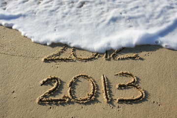 2013 with a wave washing away 2012