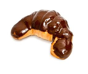 Croissant with chocolate coverage isolated.