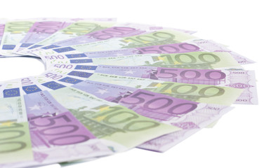 notes 100 and 500 euros on a white background