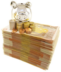 tirelire argentée sur liasse de billets