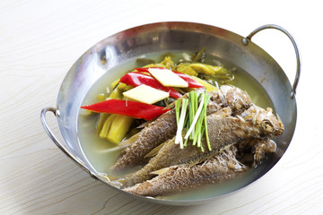 Wok burning of marine fish