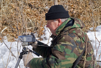 Naklejka premium Man with camera 16