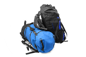 Two used tourist backpacks isolated on white